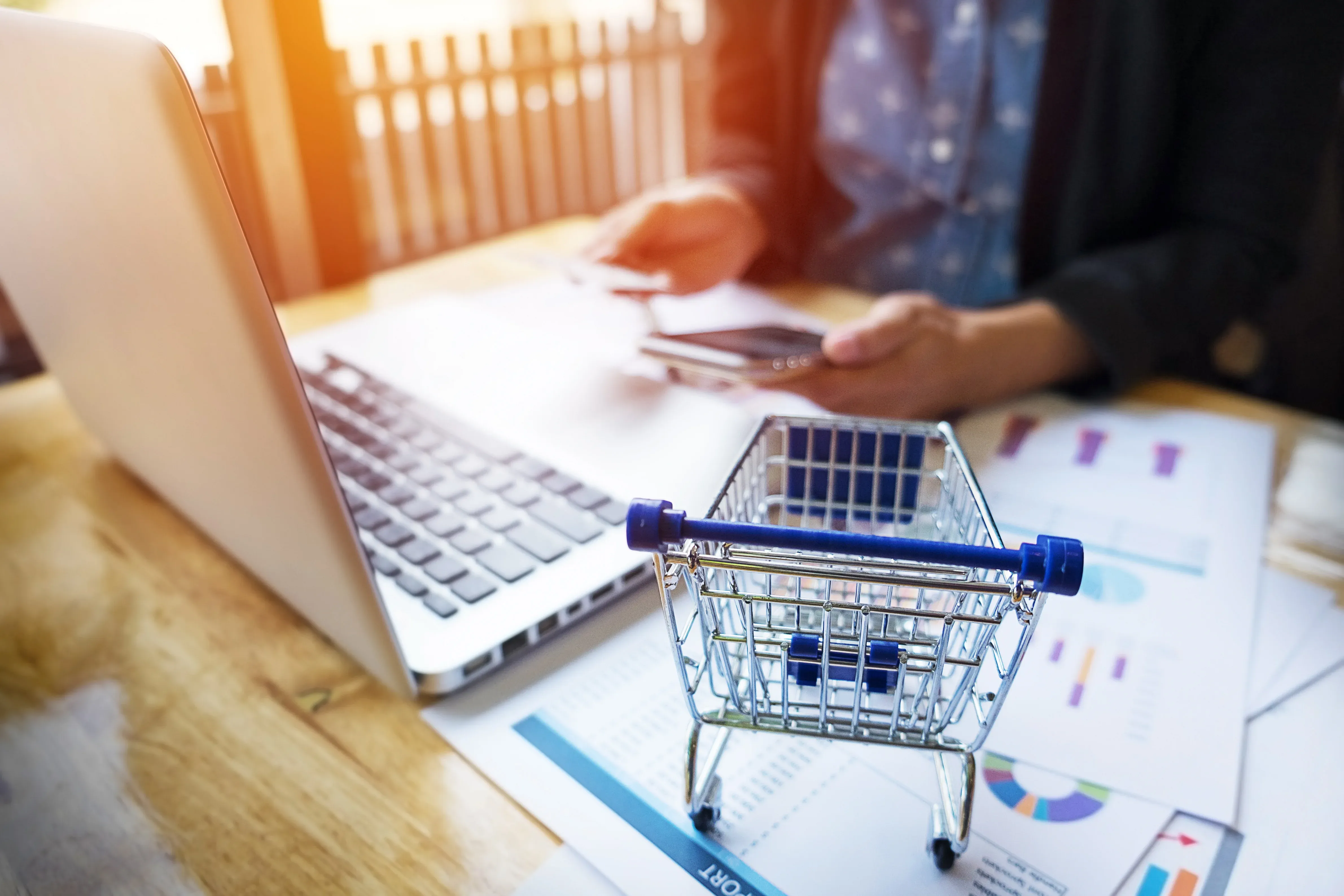 cropped-image-woman-inputting-card-information-key-phone-laptop-while-shopping-online.webp